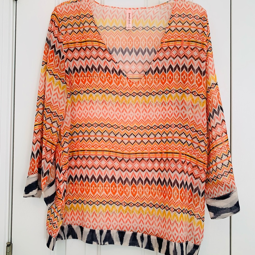Gorgeous Sweet Pea Tunic. Boutique favorite.
